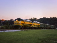 Northbound through Rosedale at last light, CNR/ONR's joint Northland rumbles through the Don Valley to start its overnight, 15 hour run to Hearst.

<br><br><i>Scan and editing by Jacob Patterson.</i>
