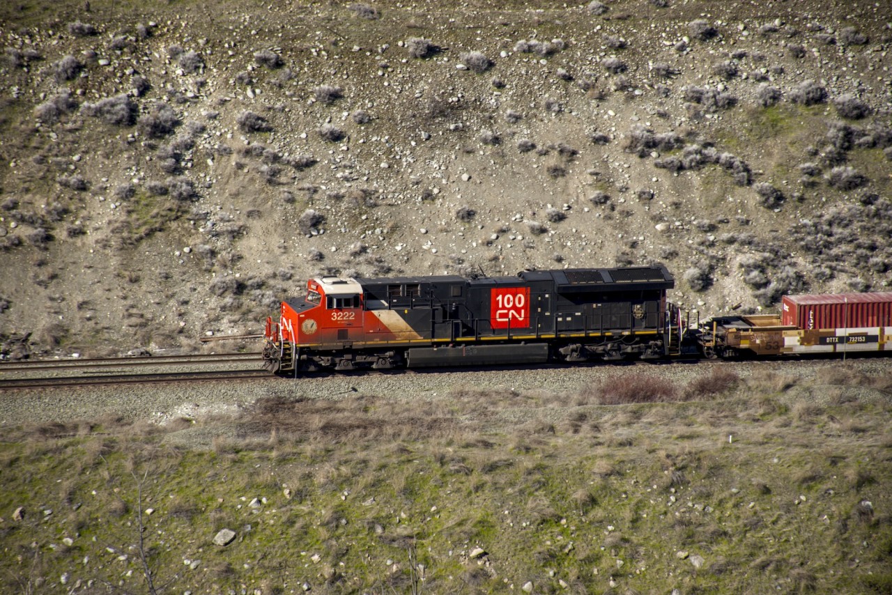CN 3222 leads a long intermodal train through Lytton at the start of the Fraser Canyon. CN and CPKC both run through the canyon, and they have agreed to directional running, so CN and CPKC trains can be seen on either of the two lines. This also reduces the need for ridiculously long sidings.