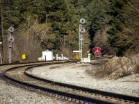 A CPKC coal train waiting to get the light in Boston Bar on the CN Yale Sub. A CN intermodal had just passed with the addition of a fresh crew, and this train was presumably doing the same, with a CPKC crew change van waiting off to the side. 