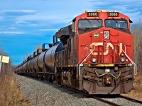 CN L57551 shoves a loaded LPG train past mile 680 of the CN FSJ subdivision.