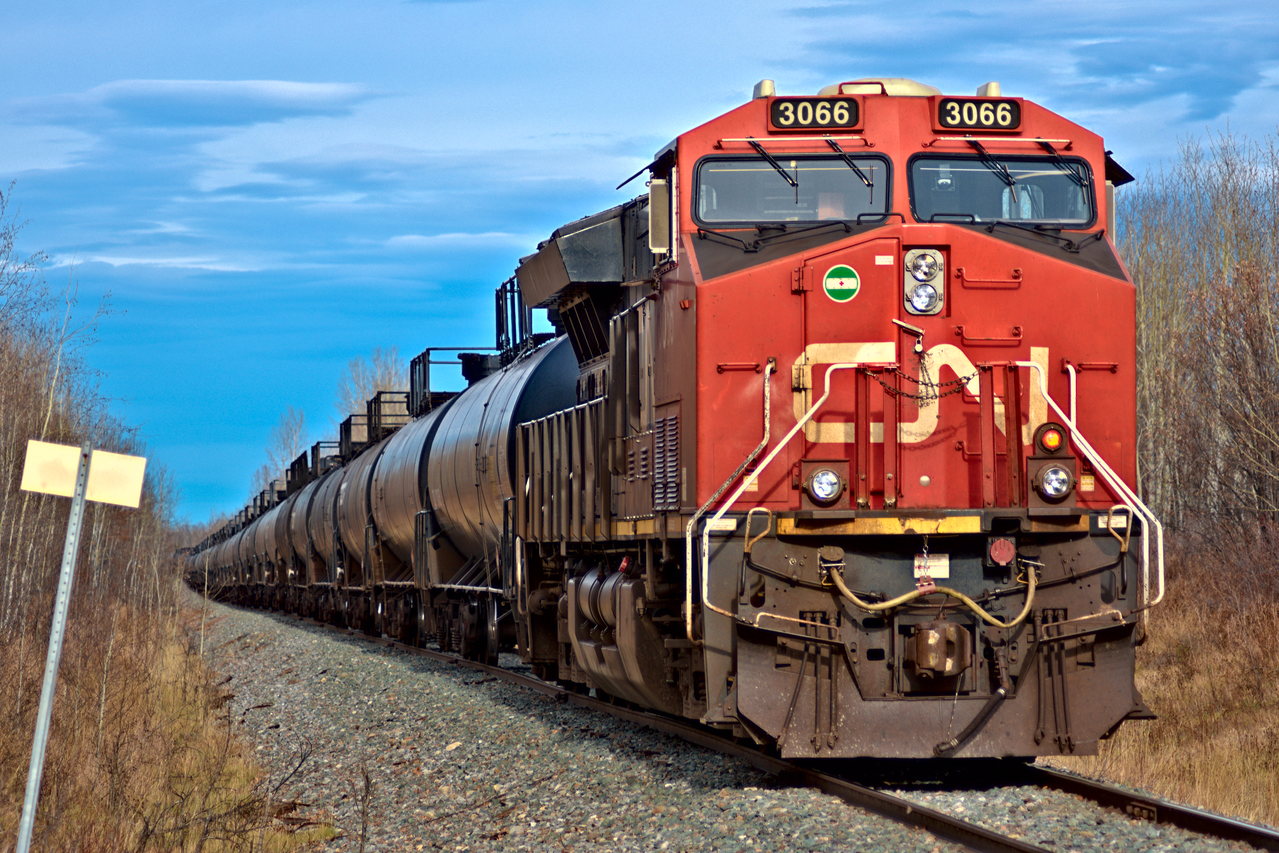 CN L57551 shoves a loaded LPG train past mile 680 of the CN FSJ subdivision.