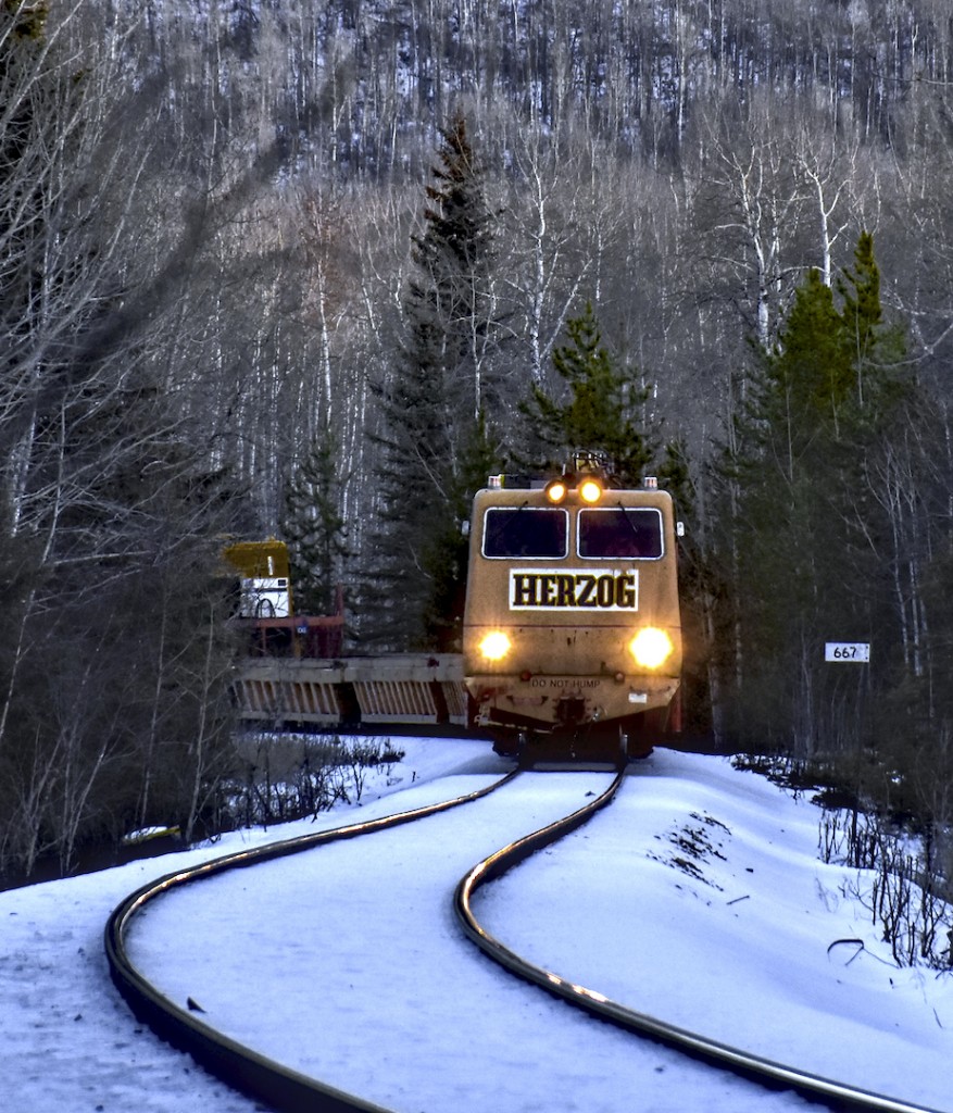 CN was doing doing some track maintenance at the time of the photo, and this MOW train had been making a few appearances along the subdivision. I had heard a whistle in the distance, and was fully expecting one of the daily sand or LPG trains to come by. Caught me a bit off guard, but worked out in my favor!