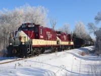 The OSR St. Thomas job passes through a winter landscape covered in hoar frost on the way to Putnam to work a few industries before continuing on to St. Thomas. 