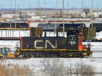 Heritage units? While everyone freaks out about CN's America 250 heritage units the real heritage is at mac yard, toiling away, and you have to be lucky to find it working let alone this far south. CN 7311 is the last CN SW1200 officially on the CN active roster, but there are others: RT110/1394 in yellow at Mac Yard, 7304 in Hamilton, and fairly recently in 2020 one or two at the Hallet Dock company in Duluth  as CN bought this dock and assigned DMIR 1250 (ex CP) and 1251 to the dock. 1250 to replace a green NW-2 that's been a fixture at that dock for many decades. 

