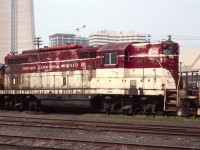 TH&B GP-9 #402 is seen near Toronto Union Station in August of 1985. The CN tower base proves this is a Toronto photo.