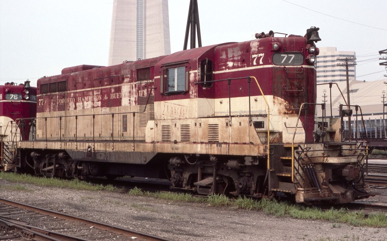 TH&B GP-7 #77 is shown near Toronto Union Station in August of 1985. That was indeed a nice locomotive paint scheme, although seen here faded after years of heavy work by the #77.