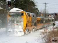 A frigid winter morning sees trailing VIA Rail P42 907 caked in snow as P42 909 leads train 84 through the town of Baden, Ontario on the CN Guelph Subdivision. 