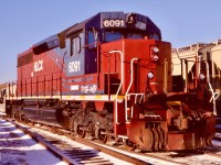 The early years of six axle power on the GEXR was interesting with a trio of leased HLCX SD40’s coming from sister GW company CORP. The trio reportedly came equipped with Woodward traction control equipment that was a bit complicated to maintain. Nevertheless the trio lasted several years before being replaced by other SD40’s and of course the popular “tunnel motor”. HLCX 6091 was a personal favourite for me as it was a former CN SD40. A former Conrail SD40 and Rio Grande SD45 rebuilt into a SD40 rounded out the group. This day 2 of the lessors were in Goderich with the third in Stratford.  The 6091 still sports CN’s dual air tanks and notched cab roof above the bell where the horn was once located. I’m not sure where these units ended up after their time on the GEXR but one story had them sold for scrap. 