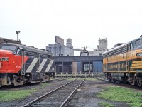 CN 6786 and Ontario Northland 1500 are bookends for the turntable at CN's Spadina engine facility in Toronto on June 13, 1972.