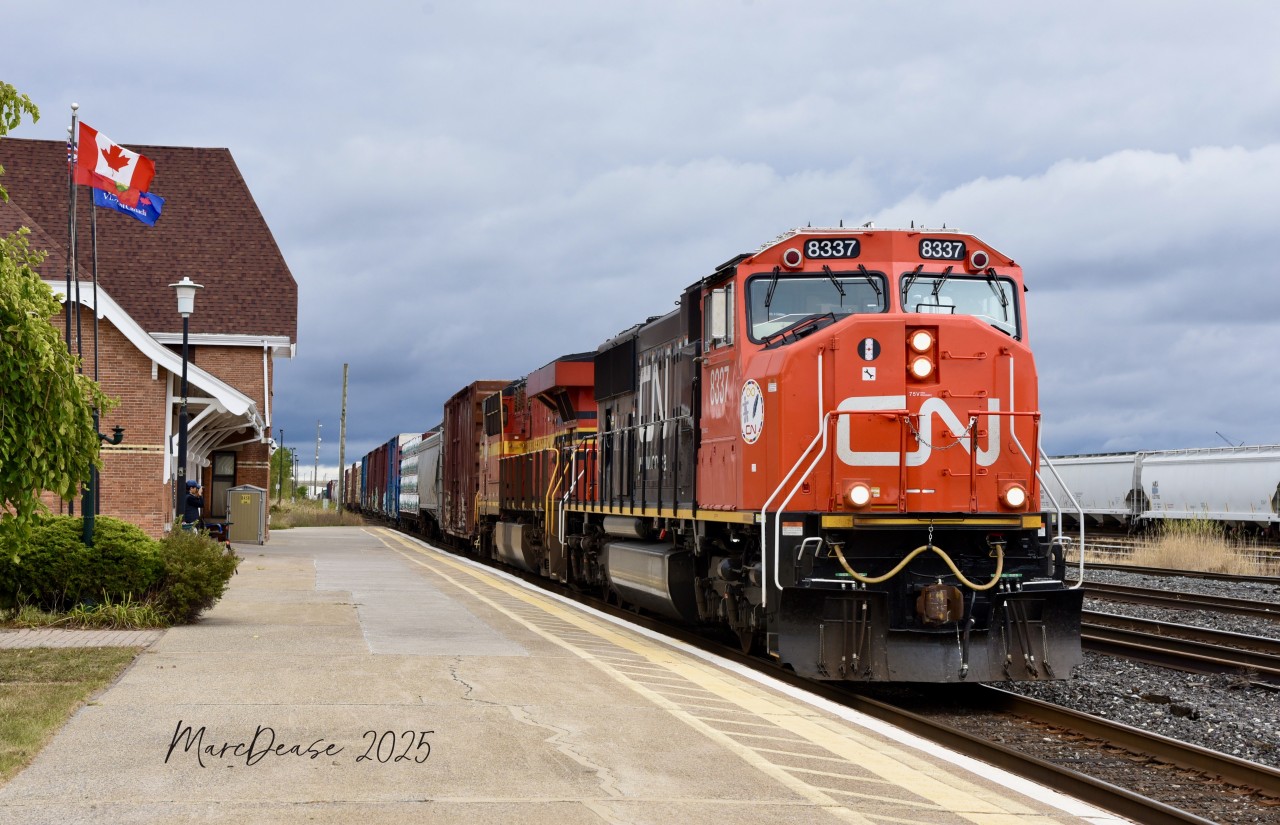 Train 399 rolls through Sarnia, ON., with a fresh new rebuilt CN 8357 leading and Norfolk Southern Heritage Unit 3114 trailing.