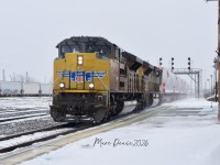 CN train 388 with windmill parts rolls into Sarnia, ON., with UP 8922 leading and UP 8403 trailing.