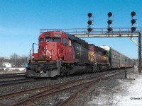 A westbound CN with CN 5380 in the lead and a Wisconsin Central unit trailing heads through Paris Jct. on a nice winter afternoon in 2007.