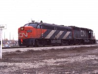 I never did find out what ailment affected the 'rare' MLW FPA-2u #6758; but it languished away at Hamilton's Stuart St engine house for awhile before finally being towed off to (I presume) MAC yard by CN 4004 on a special move.  It is a dreary Sunday morning, rather fitting for the occasion.
Note this is pre- Burlington WEST.