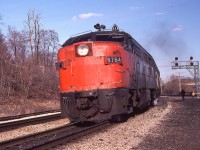 Close-up of a westbound VIA train showing CN 6764 after a "Nose Job".
Many, or most, of these old cab units either had their nose "CN" covered up and then painted into VIA colours later, or just went straight to the VIA paint job.
I've never been able to compile a list of who got what over the years.