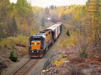 Colourful late fall day as ONR 1805, 1733 make their way south to Englehart as seen from the Hwy 112 overpass.