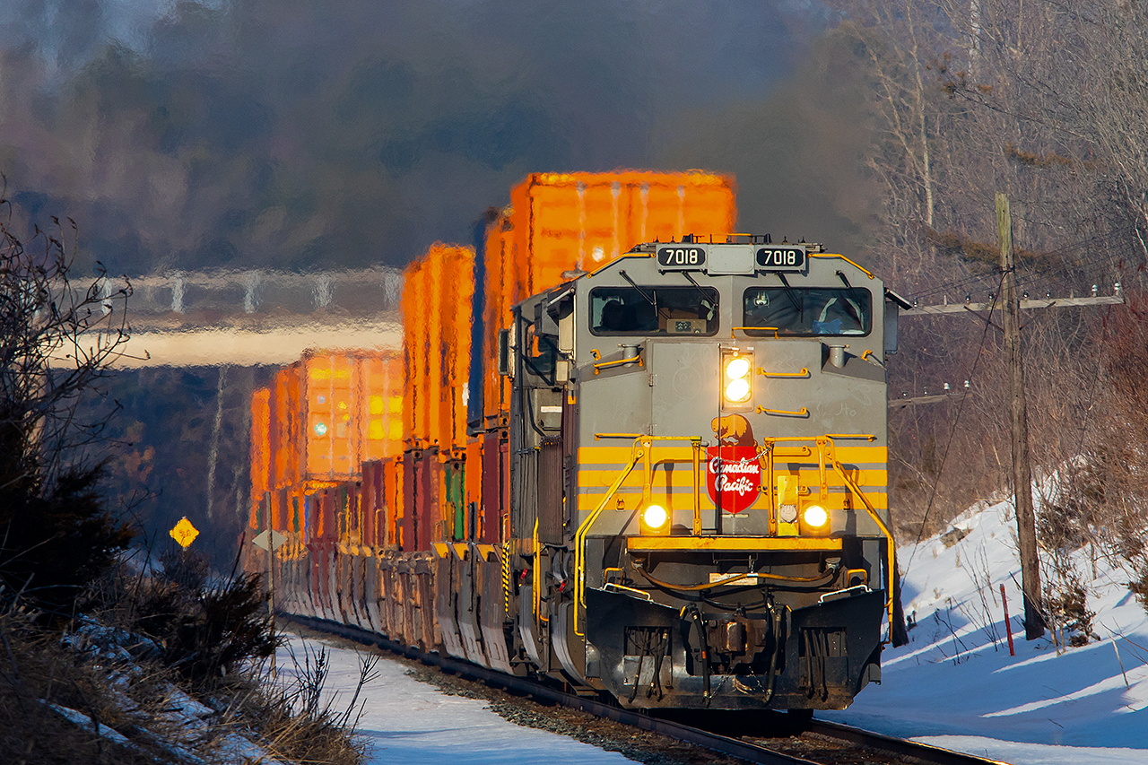 It's not often the right locomotive is leading at the right time.  Every now and then it happens though as 7018 leads a westbound into the evening sun on the climb out of Trenton.