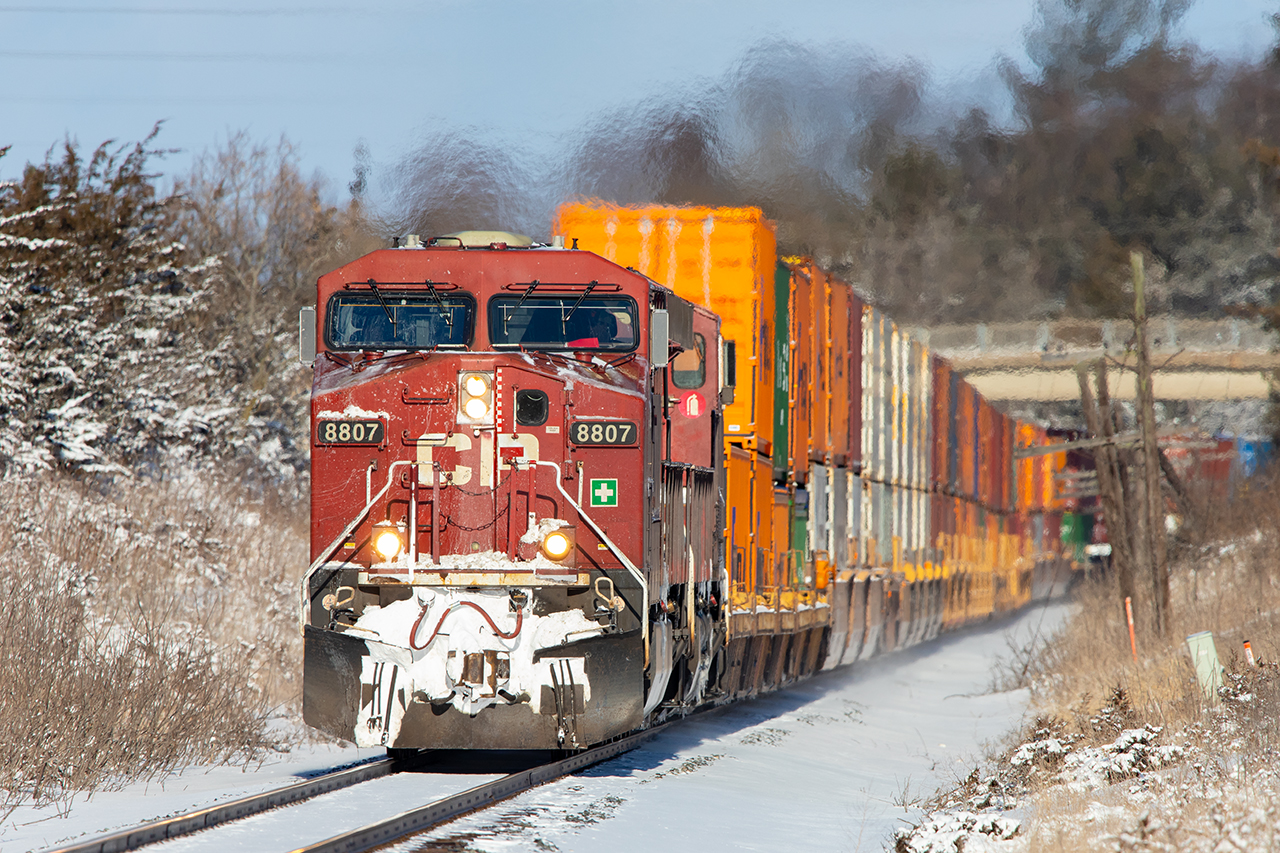 CP 8807 pulls out of Trenton westbound. Sun and fresh snow create my favourite railroading scenes.