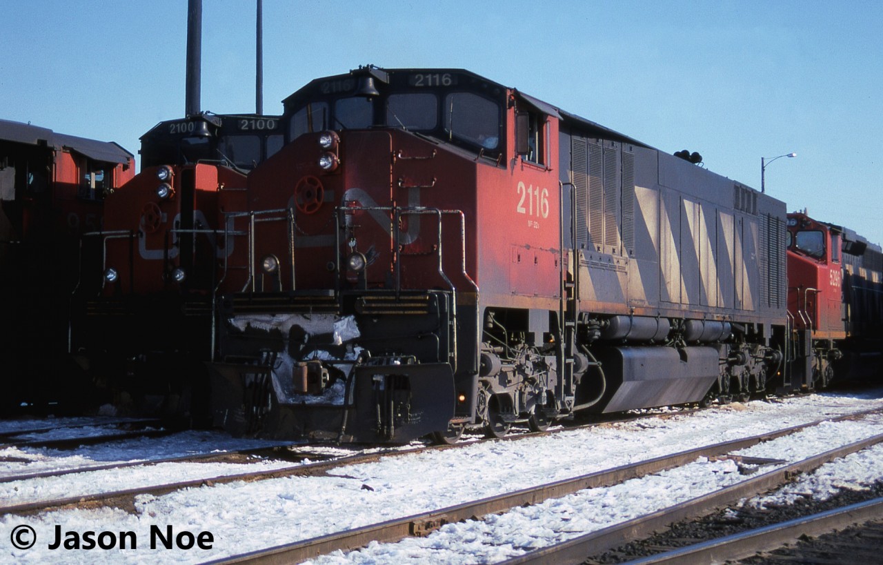 CN HR-616 2116, alongside HR-616 2100 are pictured waiting to depart the MacMillan Yard diesel shop tracks on outbound trains in Vaughn, Ontario. Behind 2116 were SD40-2(W) 5296 and GP40-2L(W) 9536.
