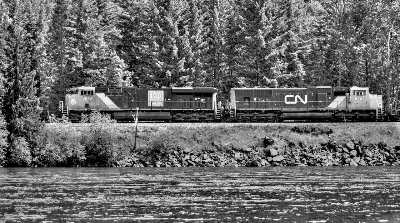 CN 3879 leads an intermodal train heading towards Jasper AB up the Clearwater Sub. Nice to catch an older SD75I trailing. Notice that the front door is open. oops...