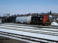 During a winter morning, CN SW1200RSm 7305 is pictured switching the Brantford yard on the CN Dundas Subdivision. The crew was sorting tank cars for train 560, which at the time, operated from Brantford to Nanticoke and return. 