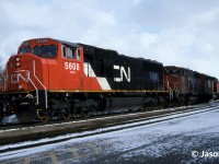 CN train 399 is seen at Brantford, Ontario on the Dundas Subdivision about to perform some work. The consist included; SD70I 5608, GP40-2L(W) 9477 and SD40-2(W) 5325. Just over five months prior, SD70I 5608 had rolled out of the GMDD plant in London during September 1995.