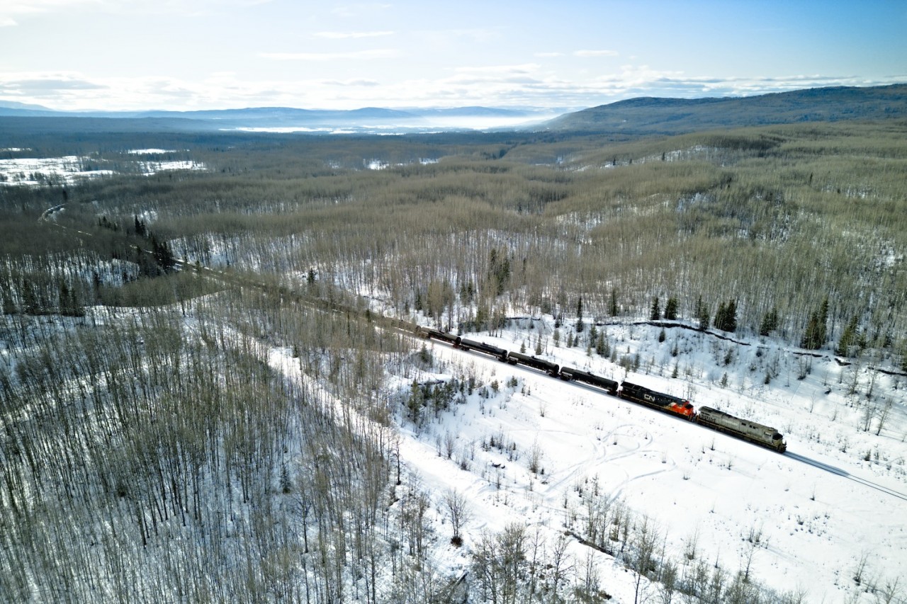 CN 2776 leads an LPG train north to Fort St. John. Note the haze in the air towards the mountains.
