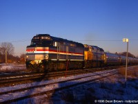 AMTK F40PH-2 245 and VIA F40PH-2 6451 lead 98 through St. Catharines.