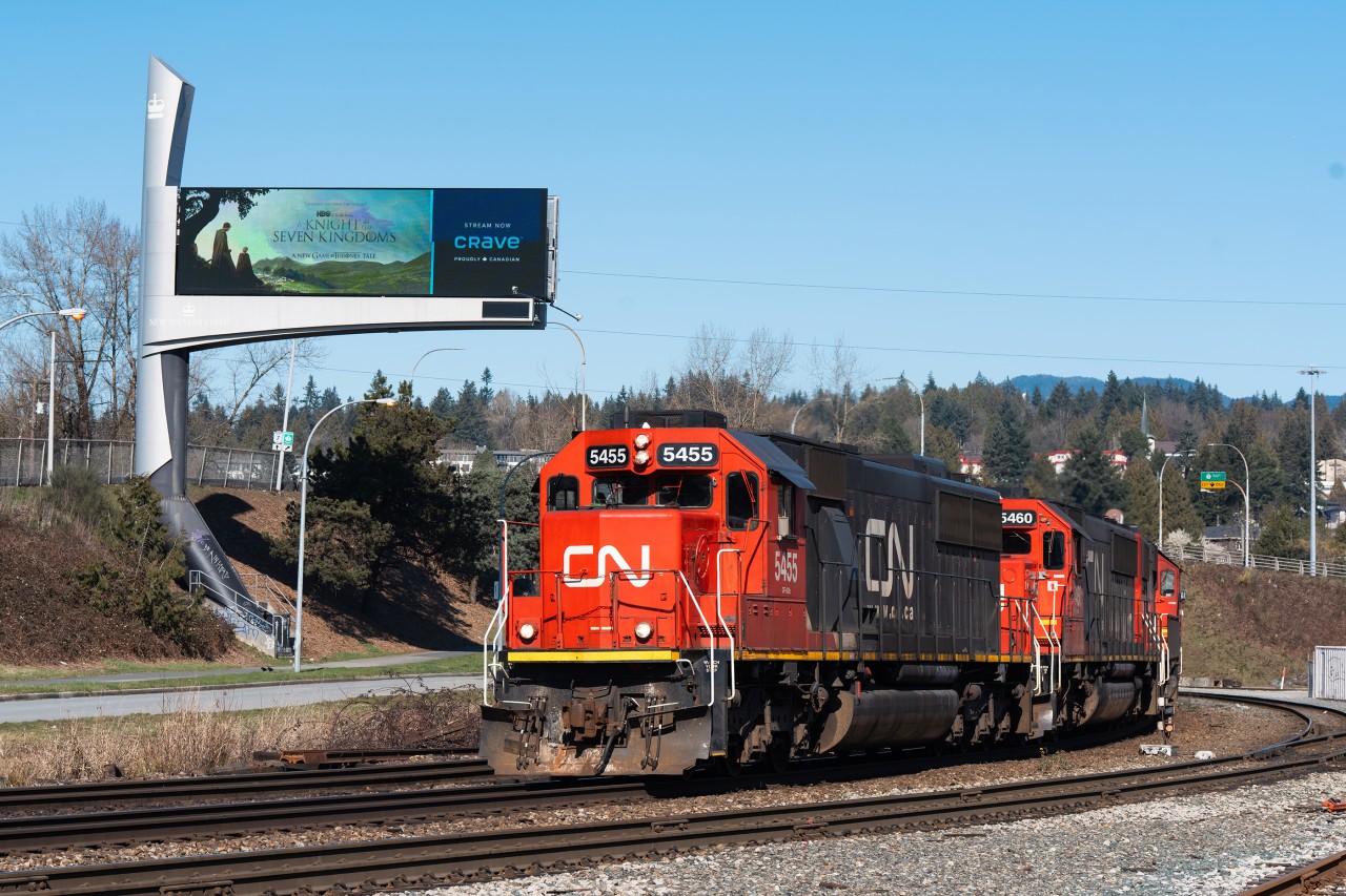 CN's daily transfer from North Van to Thornton rolls though the junction at Braid in Sapperton, on the outskirts of Vancouver with three ex-Oakway's on the headpin.