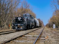 Tying back onto their train after working Vesuvius, GIO's Welland Job pauses on the former site of WX interlocking, where the Canada Southern Canada Division mainline once crossed the CNR Welland Sub, prior to the opening of the Welland Canal By-Pass project in 1973.

<br><br>After knocking off the handbrakes, a brief switch at Verbio is in order before returning to Feeder.


<br><br><a href=https://www.flickr.com/photos/29268670@N04/54847476751/>1970: Southbound CN local</a>
<br><a href=https://www.canadasouthern.com/caso/images/welland-24.jpg>1971: facing west showing tower</a>
<br><a href=https://www.canadasouthern.com/caso/images/welland-25.jpg>1971: facing west from WX Tower</a>
<br><a href=https://www.canadasouthern.com/caso/images/welland-26.jpg>1971: facing east from diamond, Niagara Falls to left, Fort Erie to right</a>
<br><a href=https://www.flickr.com/photos/29268670@N04/51992434801/>1972: C&O westbound at WX</a>
<br><a href=https://nycshs.omeka.net/items/show/144617>Eastbound at WX</a>
<br><a href=https://www.canadasouthern.com/caso/images/nyc-2003-7.jpg>Meet at WX</a>