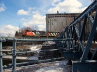 CN 500 is entering the Port of Montreal the day after an ice storm passed through the area.