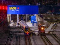 The second of three sets of Ontario Northland Siemens equipment has been delivered to VIA Toronto Maintenance Centre.  Arriving at 00:43, CN L276 negotiated their way through the yard with VIA crews driving ahead to line up their movement to the fuel stand, where ONT 1802 was waiting.  Now tied down, CN 5708 has cut away, and runaround for the conductor to grab the EOT before heading back to Aldershot.  In the distance, a conductor's lanterns sways, giving hand signals to ONT 1802 as it crawls back towards the newest delivery.