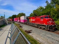 As numerous GO and Union Pearson trains whoosh through the tunnel behind me, the crossing gates fall at the John Street pedestrian crossing for Montreal-bound CPKC 114 rumbling through Weston.