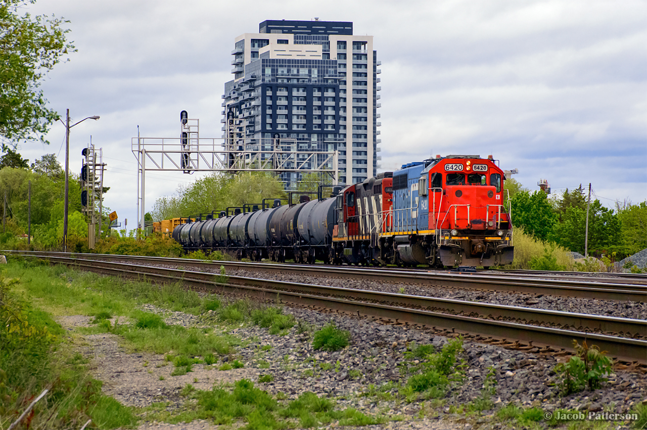 Usually serving customers along the Halton Sub, work was swapped for L551 and L557 this Friday afternoon on account of a weekend closure along the Oakville Sub as part of the Burloak grade separation.  After working Wyo-Ben, CertainTeed, and Suncor, L551 passes through Burlington West on approach to Aldershot.