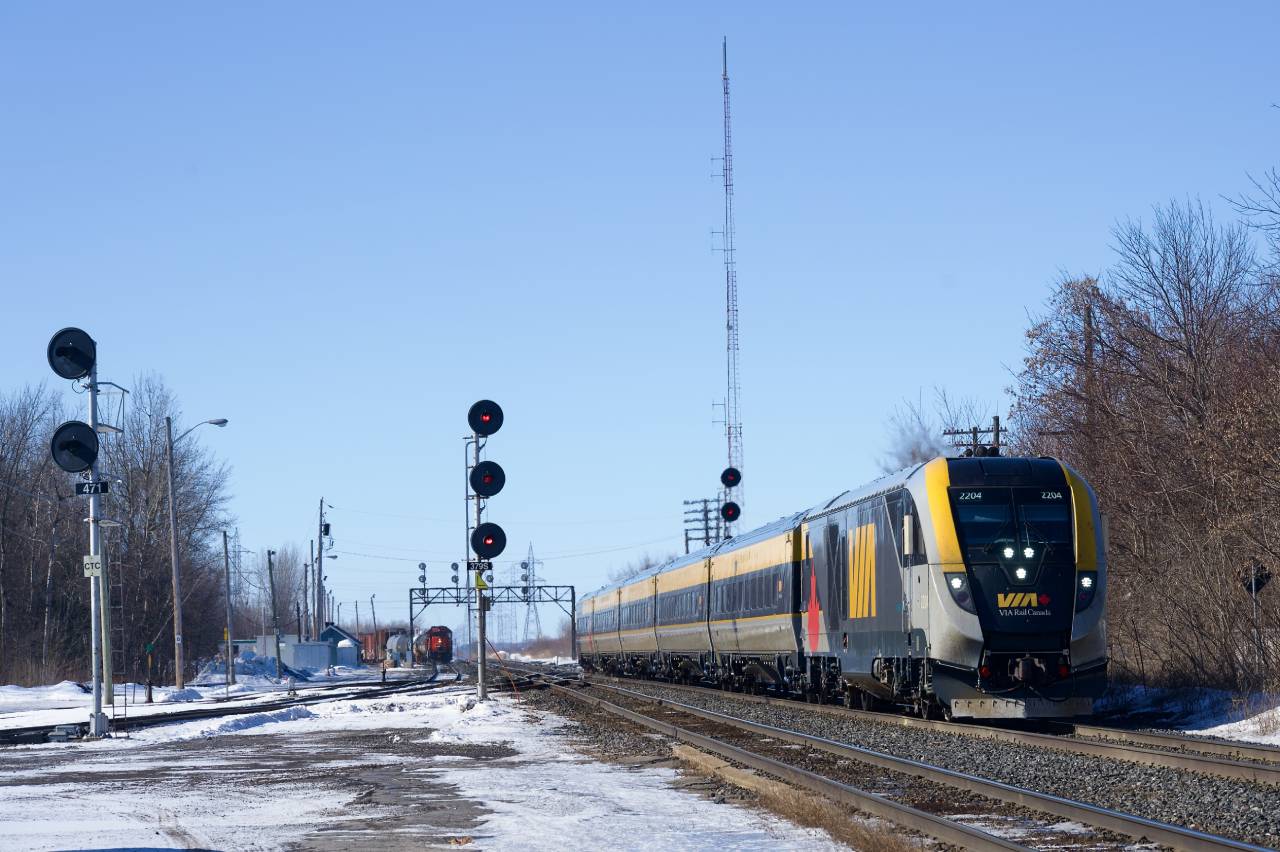 A late VIA 624 has just come off of the Alexandria Sub at Coteau as CN 538 works in the background.
