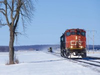 VIA 24 with VIA 2215 leading is about to overtake light power CN 589 at De Beaujeu (with CN 9454 & IC 9628),