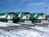 GO Transit F59PH's 529, 552 and 553 (with part of 535 tucked in, barely visible) sit at the layover yard at CP Guelph Junction. This was the original layover location for Milton line GO trains until a new Milton layover facility was built near Hornby off Fifth Line in the 2000's.
<br><br>
<i>Pierre Ozorak photo, Dan Dell'Unto collection slide.</i>
<br><br>
<i>Note: longtime rail photographer and slide collector Pierre Ozorak <a href=https://www.arbormemorial.ca/en/forestlawn/obituaries/pierre-ozorak/154354.html><b>recently passed away in January 2026.</b></a>. Condolences to his friends and family, he will be missed by the rail photography community.<i>