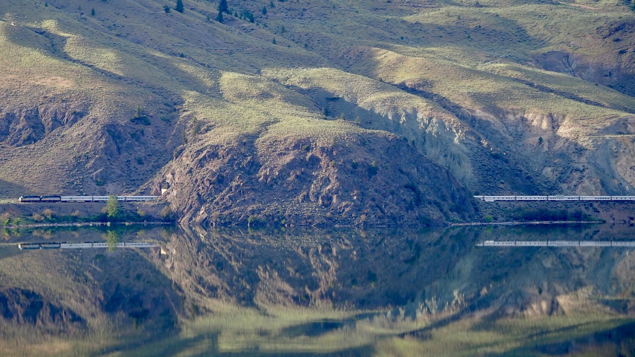 CN has this really funny tradition of taking the initials of a person’s first name and middle name then jamming them to the front of their surname and coming up with station names. So, in this case, The Canadian is just departing Jaleasie. The man the station is named after is a former Superintendent of Kamloops, J. A. Leslie. Other examples include: Wabron (W. A. Bron) on the CN Clearwater sub and Wabowden (W. A. Bowden) divisional point on the Hudson Bay Railway. I would love to see railroaders butcher the pronunciation of Mpkreiser station.
