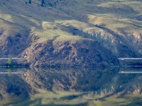 CN has this really funny tradition of taking the initials of a person’s first name and middle name then jamming them to the front of their surname and coming up with station names. So, in this case, The Canadian is just departing Jaleasie. The man the station is named after is a former Superintendent of Kamloops, J. A. Leslie. Other examples include: Wabron (W. A. Bron) on the CN Clearwater sub and Wabowden (W. A. Bowden) divisional point on the Hudson Bay Railway. I would love to see railroaders butcher the pronunciation of Mpkreiser station. 