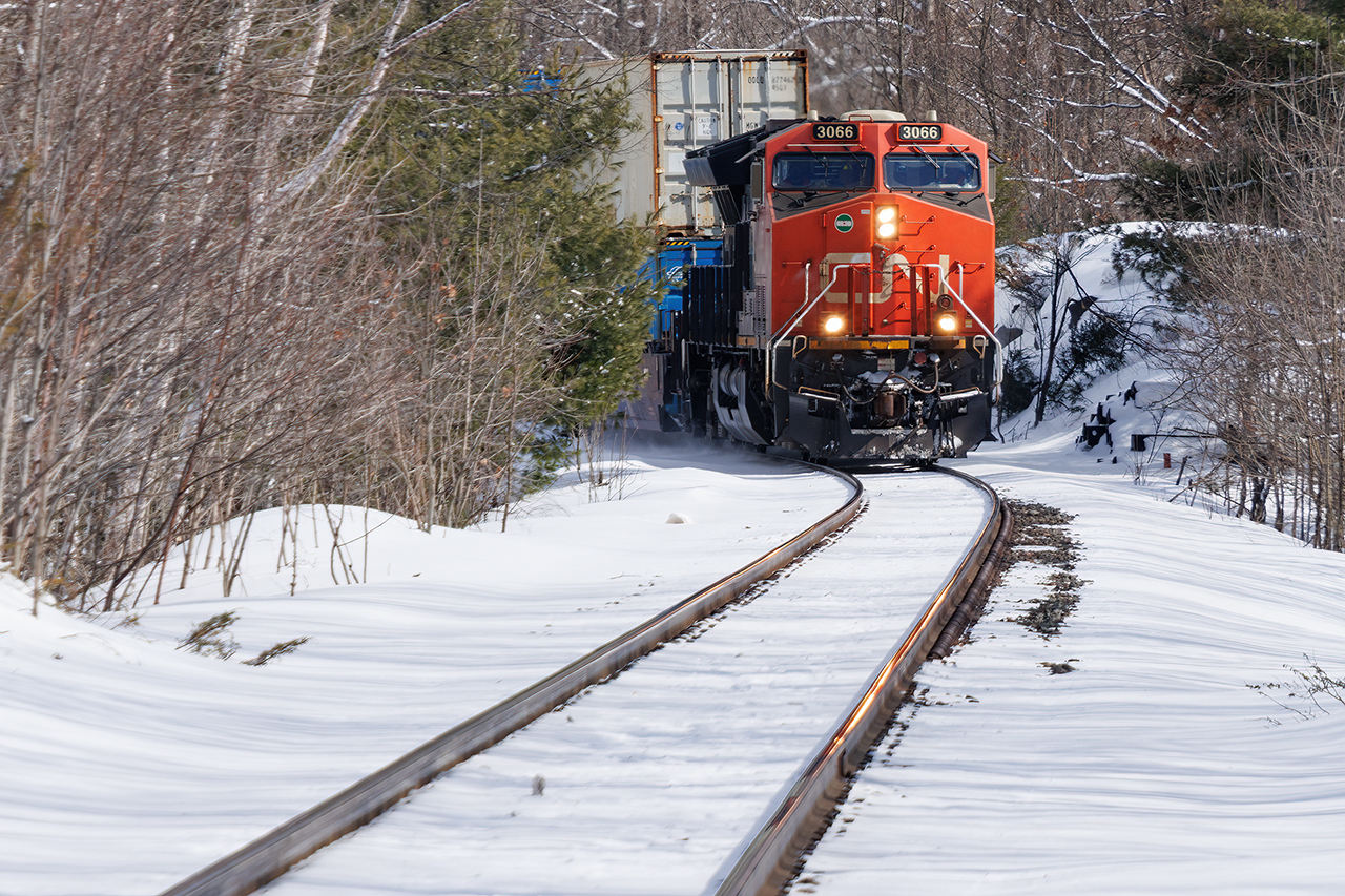 9500 feet trail, one mid, one tail DPU as 183 heads for Boyne and the crossover to CP's tracks headed west.