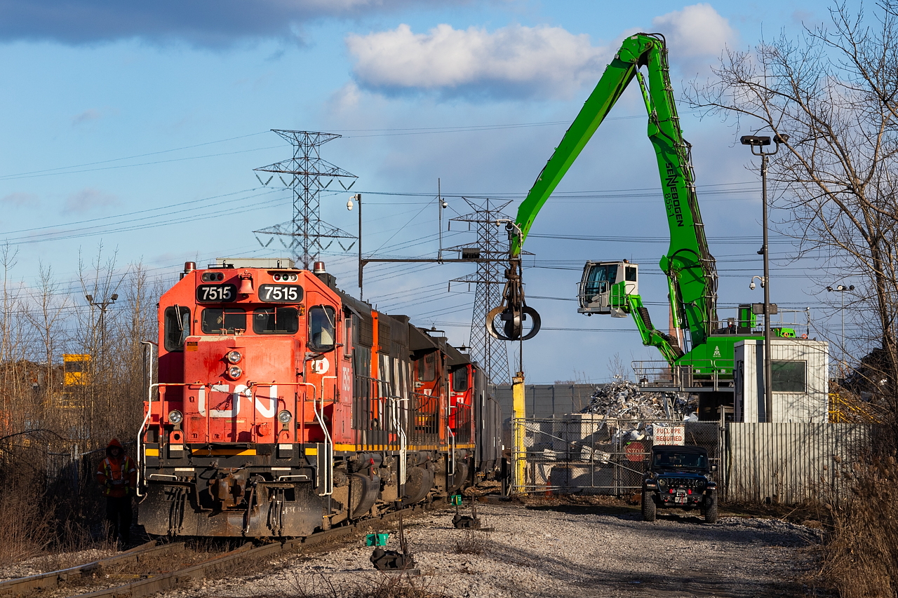 When the 1600 Yard Job arrived in Strathearne Yard, AIM got on the radio telling CN they had more load for them tonight, and the crew decided it was easiest to just go there themselves. Something you don't get to see all that much (AIM shuffles cars themselves between their facility and Strathearne Yard).