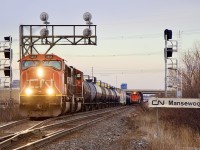 Late light seemed fitting to frame the falling searchlights at Mansewood. Time waits for no one, and soon the new signals will be cut in as the entire subdivision is rapidly switching to new LED signals. I’ve spent many years photographing the area along with its constant changes, from the line itself to its motive power. Many fond memories. Even the pair of SD75’s leading train 424 will soon find their turn in undergoing a full rebuild.
