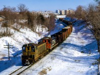 A transfer from Mimico - Toronto yard is seen northbound along the Bala Sub approaching Don Mills Road nearing Oriole.<br><br><a href=https://www.railpictures.ca/?attachment_id=55943>Transfers meeting further south</a><br><a href=https://www.railpictures.ca/?attachment_id=58009>Toronto - Mimico transfer by Don station</a><br><br><i>Scan and editing by Jacob Patterson.</i>