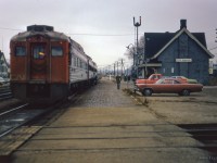 A trio of eastbound RDCs pause at Ingersoll, while <a href=https://www.railpictures.ca/?attachment_id=57501>CN 1213 works the yard</a> behind the photographer.

<br><br><i>Scan and editing by Jacob Patterson.</i>