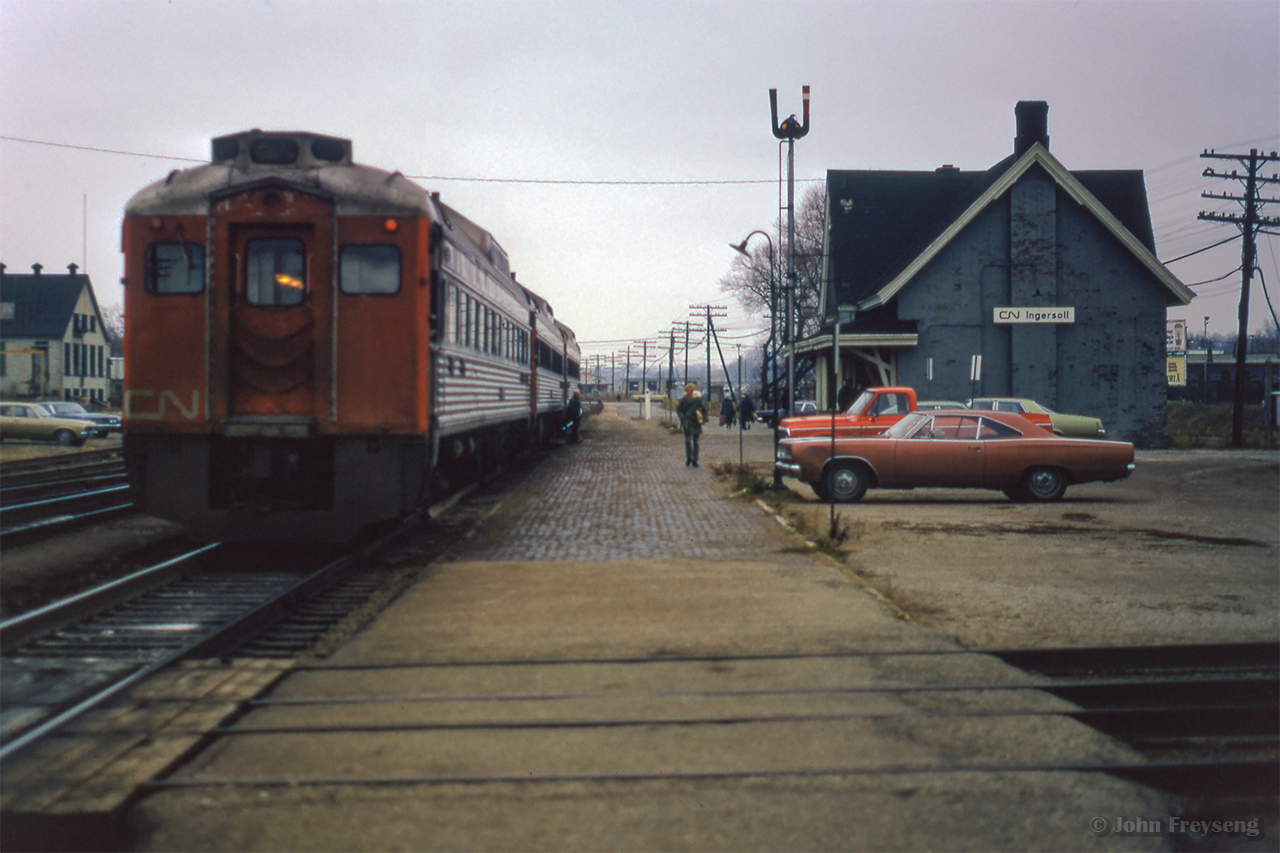 A trio of eastbound RDCs pause at Ingersoll, while CN 1213 works the yard behind the photographer.

Scan and editing by Jacob Patterson.