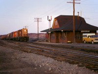 A westbound wayfreight departs Sudbury on the Webwood Sub, passing the station at Copper Cliff.

<br><br><i>Scan and editing by Jacob Patterson.</i>