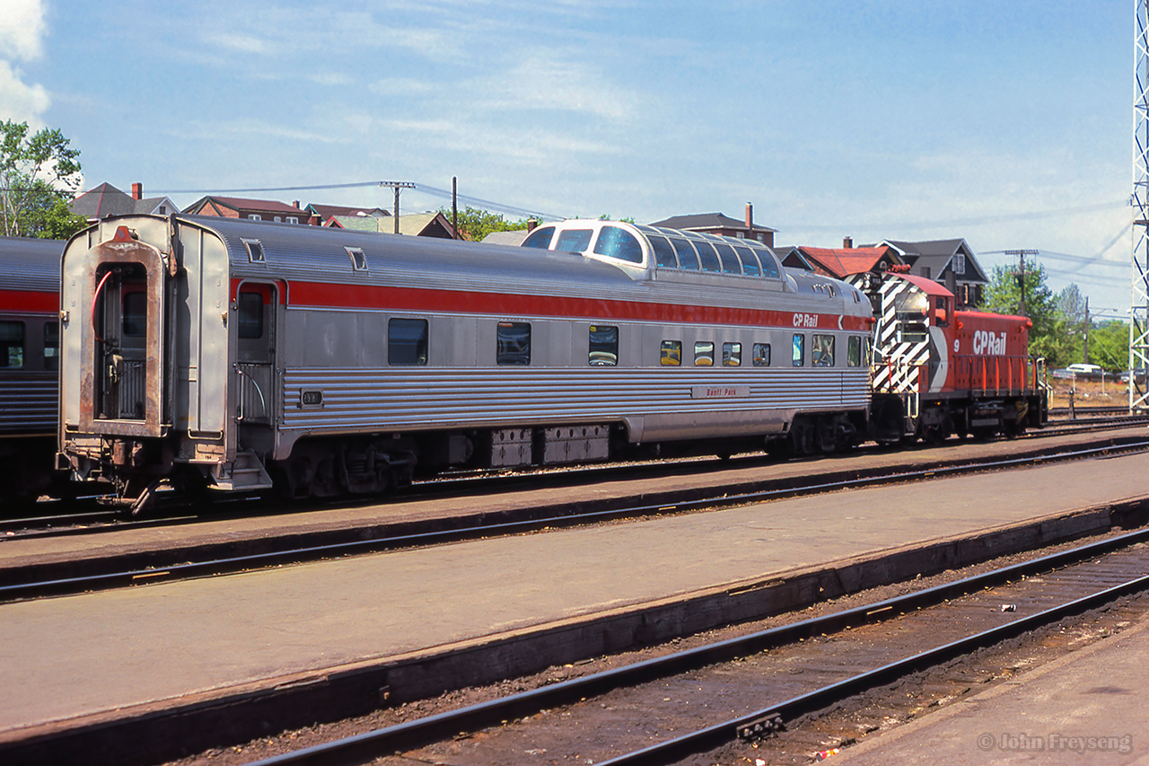 Spotted in front of Sudbury's station, CP 8159 and Banff Park await the arrival of The Canadian.

Scan and editing by Jacob Patterson.