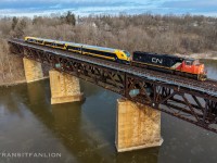 CN L27691 17 with CN 5708 on the point, Ontario Northlander TS2 (cab car 949-942-941-engine 940) in tow bound for VIA TMC, rushing through east end of Dundas sub towards Aldershot yard where Sarnia crew finished their trip and Aldershot crew will take over for the final miles on Oakville sub after MX passenger rush finishes the second day. (2026/03/18)