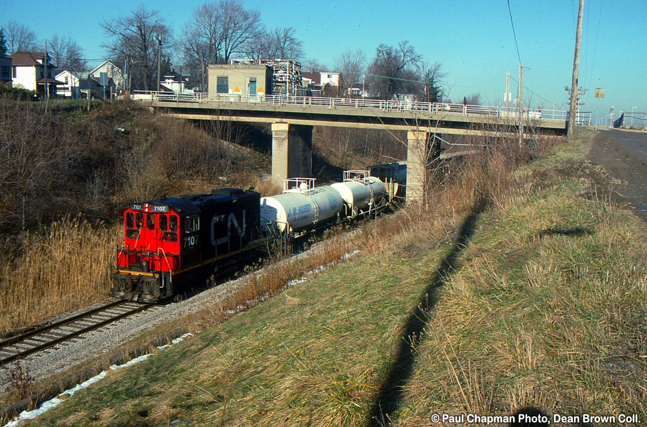 CN SW1200RSm 7107 heads up the CN Thorold Sub.