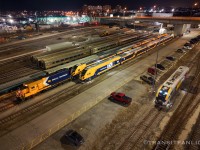 Ontario Northland’s TMC guard unit ONT 1802 spotting up Northlander TS2 ONT 940-949 on track C2, Northlander TS1 930-939 resting on track C1. VIA’s charger locomotive 2223 can be seen on closer track waiting to be coupled back on its trainset, this locomotive experienced locked axles on train 068/25 in January 2026 and was cut away at Belleville for on site truck replacement, later picked up by VIA 656/19 on Feb 19 back to MMC, then dead in tow on tail end of VIA 061/19 on Mar 19 to TMC.