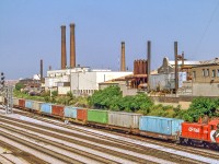 A CP SW1200RS pulls what looks like a seemingly almost-endless string of containers on July 30, 1987 in Toronto.